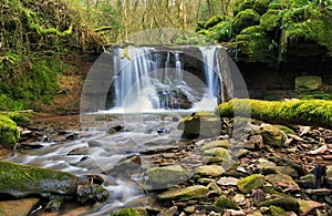 Waterfall blurred on the river Ennig; at the Pwll y Wrach nature reserve