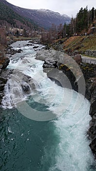 Waterfall in Bovra river in Lom in Norway in autumn