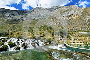 Clear waters of Canete river in Huancaya village, Peru photo