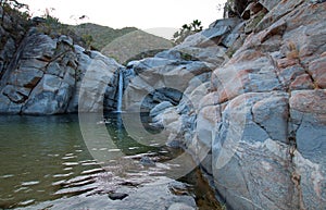 Waterfall at Cascada Sol Del Mayo on the Baja California peninsula in Mexico photo