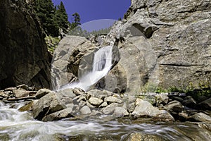 Roaring waterfall in the mountains