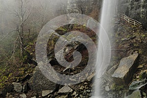 Waterfall Cascading Onto Rocks In The Indian Ladder Trail In John Boyd Thatcher State Park, New York