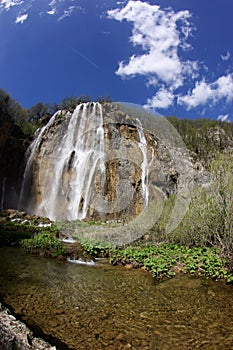 Waterfall cascading over rock