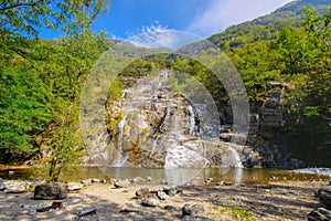 waterfall Cascata delle Sponde in the Maggia Valley  Ticino in Switzerland photo