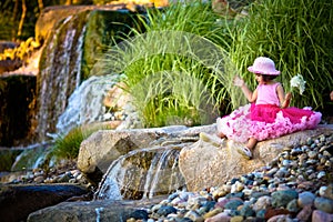 Waterfall and a child