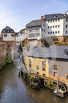 Waterfall in the city center of Saarburg, Germany surrounded by