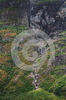 Waterfall and cliff in Geiranger fjord