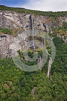 Waterfall and cliff in Geiranger fjord