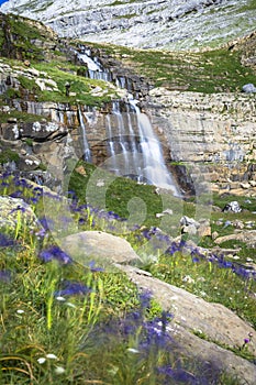 Waterfall de cotatuero under Monte Perdido at Ordesa Valley Aragon Huesca Pyrenees of Spain photo