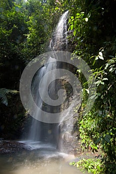 Waterfall in deep forest at island Koh Lanta Thailand