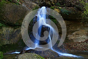 Waterfall in deep forest in the nearest village