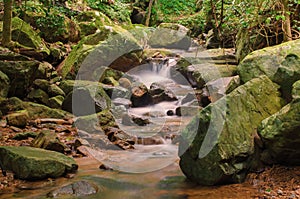 Waterfall in deep rain forest jungle. Krok E Dok Waterfall