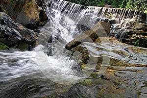 Waterfall in deep rain forest jungle.