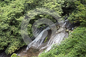 Waterfall falling over rockmass