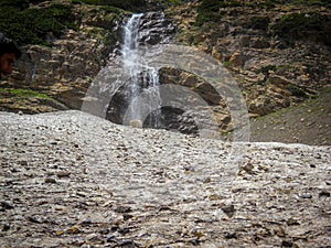 Waterfall flowing from the hill in Kashmir India. Waterfall flowing down from the hill photo