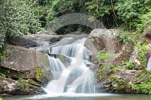 Waterfall flowing from the mountains at Phu SOI DAO waterfall.