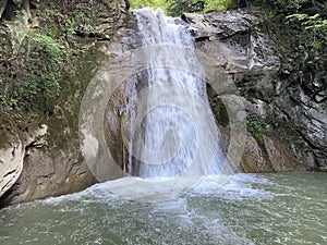 a waterfall flowing between the rocks