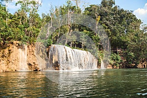 Waterfall flowing on tropical rainforest at national park