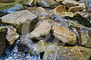 A waterfall that flows through the rock