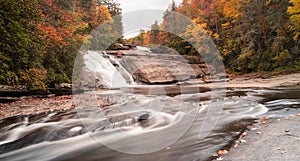 Waterfall and forest in the fall