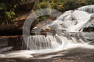 Waterfall and forest in the fall