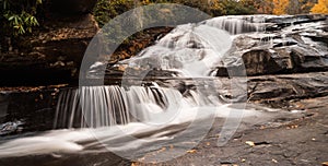 Waterfall and forest in the fall