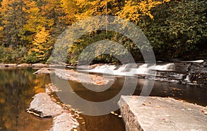 Waterfall and forest in the fall