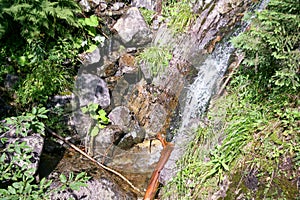 Waterfall in the forest mountain Poland