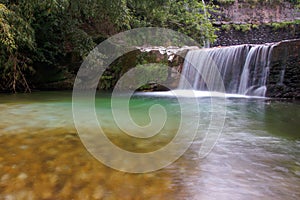 Waterfall in the forest of tuscany