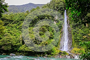 Waterfall in the forest in Westland National Park, New Zealand