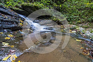 Waterfall in the Foreste Casentinesi NP in autumn, Tuscany, Ital