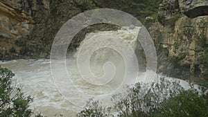 Waterfall furious river photo