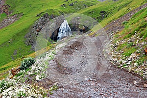 Waterfall Girlish Braids between the mountains of Northern Caucas