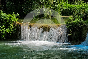 Waterfall in green jungle tropical forest