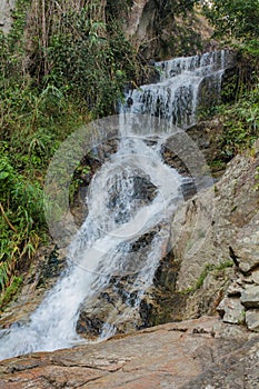 Waterfall in green jungle tropical forest