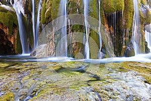 Waterfall with green moss in Jiuzhaigou