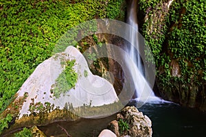 Waterfall in grot photo