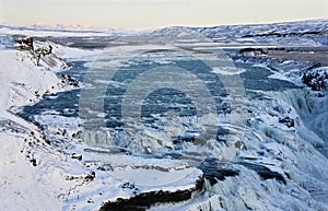 Waterfall of Gullfoss in Iceland, Europe surrounded by ice and snow