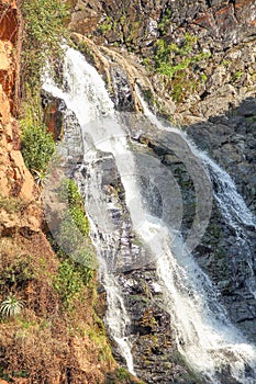 Waterfall gushing down a mountainside