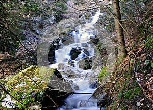 A waterfall that has silky smooth texture falling from a height