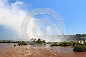 Waterfall Iguazu falls making clouds, Argentina