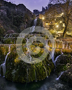 waterfall inside the village at night