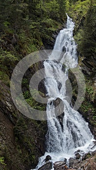 waterfall in jaufental in south tyrol photo