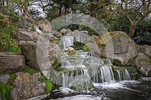 Waterfall in Kyoto Garden, a Japanese garden in Holland Park, London, UK photo