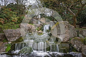 Waterfall in Kyoto Garden, a Japanese garden in Holland Park, London, UK photo