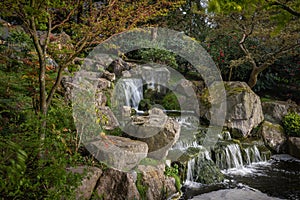 Waterfall in Kyoto Garden, a Japanese garden in Holland Park, London, UK photo