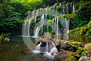 Waterfall landscape. Beautiful hidden waterfall in tropical rainforest. Nature background. Slow shutter speed, motion photography