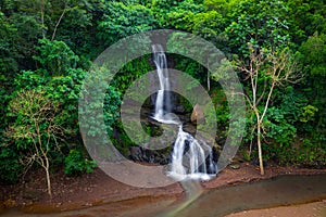 Waterfall landscape. Beautiful waterfall in Ubud. Tropical scenery. Slow shutter speed, motion photography. Nature background.
