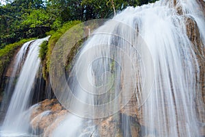 Waterfall landscape view of fresh water flows on rock