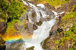 Waterfall Latefossen at sunset lights in summer, Norway